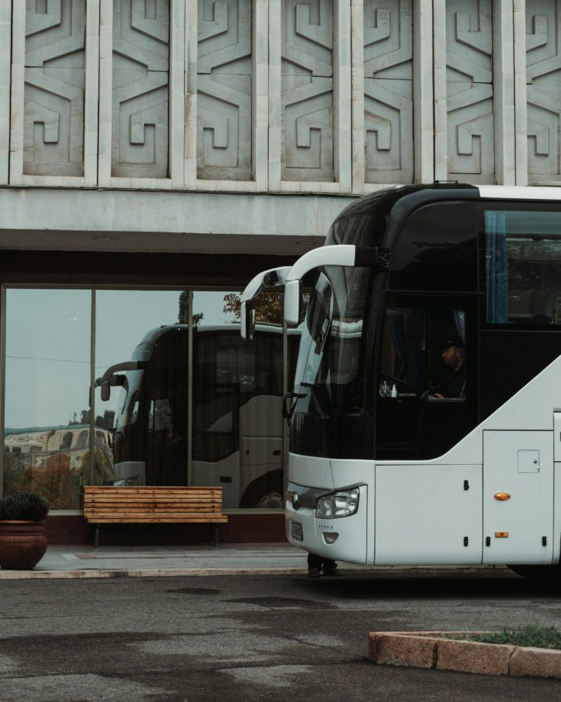 a bus parked in front of a building